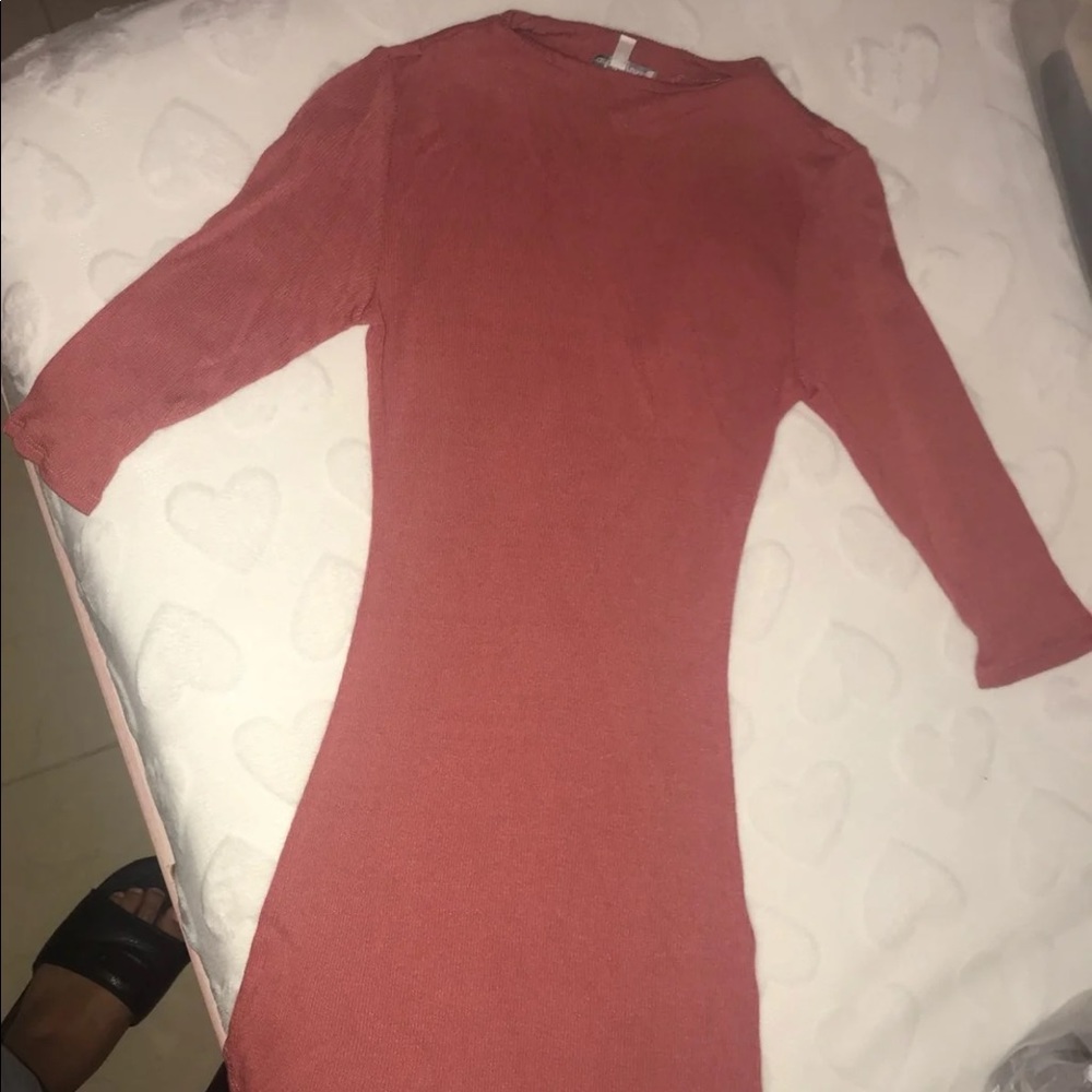 Pink dress. It is knee length.